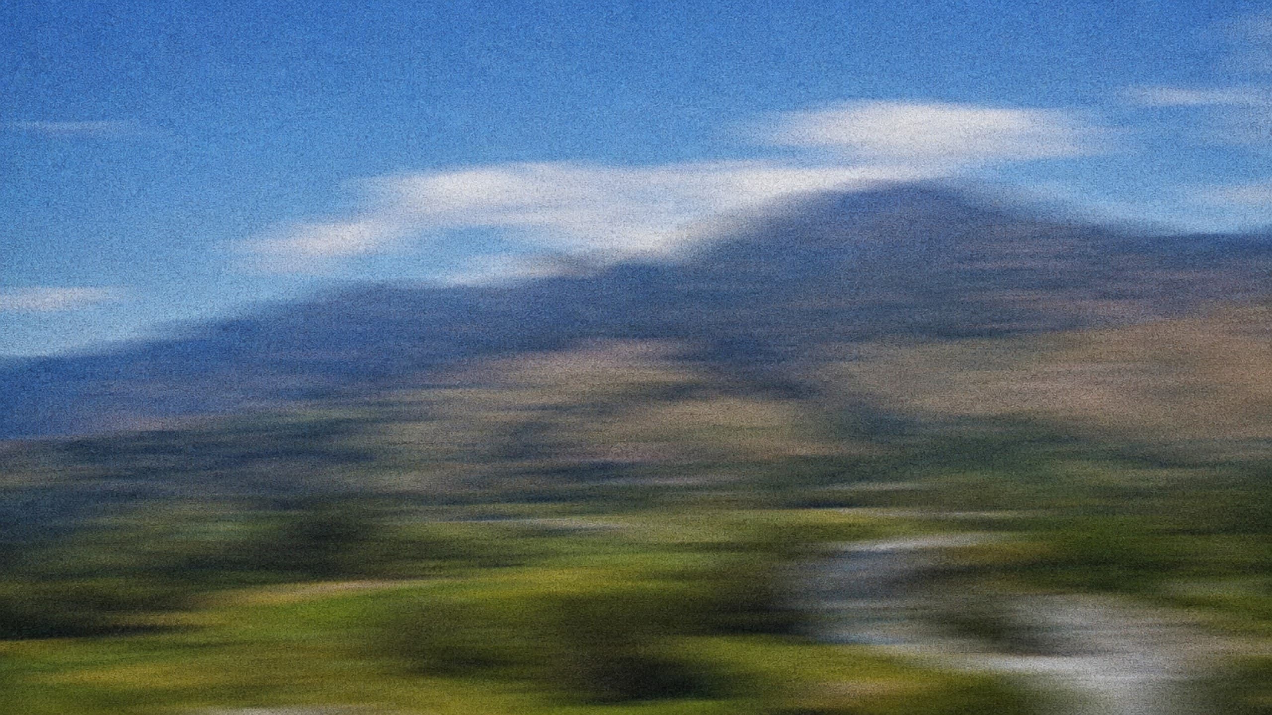 Blurred sunny valley landscape